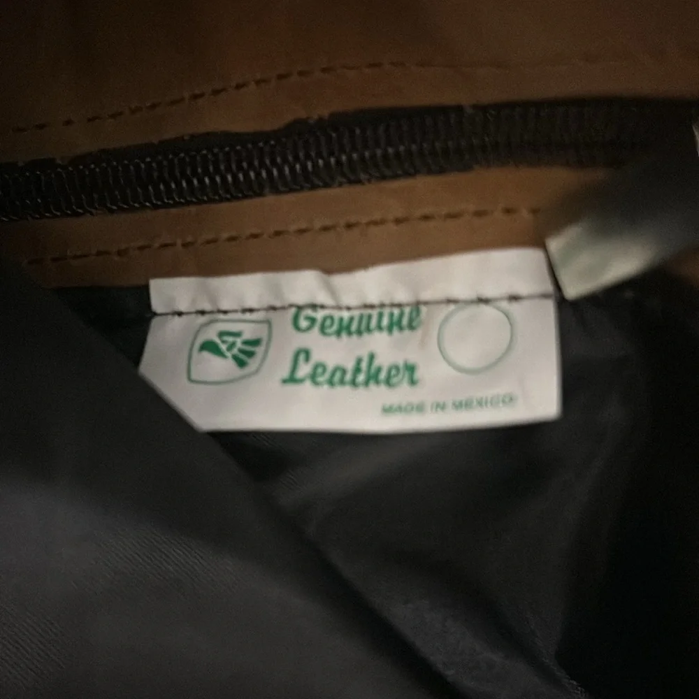 Genuine leather sling backpack